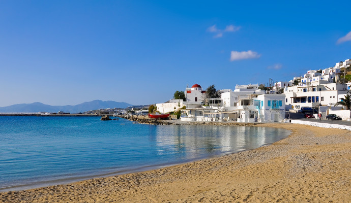 The famous Tavern on the sea mirror of the bay of the island of Mykonos