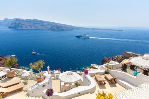 View of Fira town Santorini island White concrete staircases.