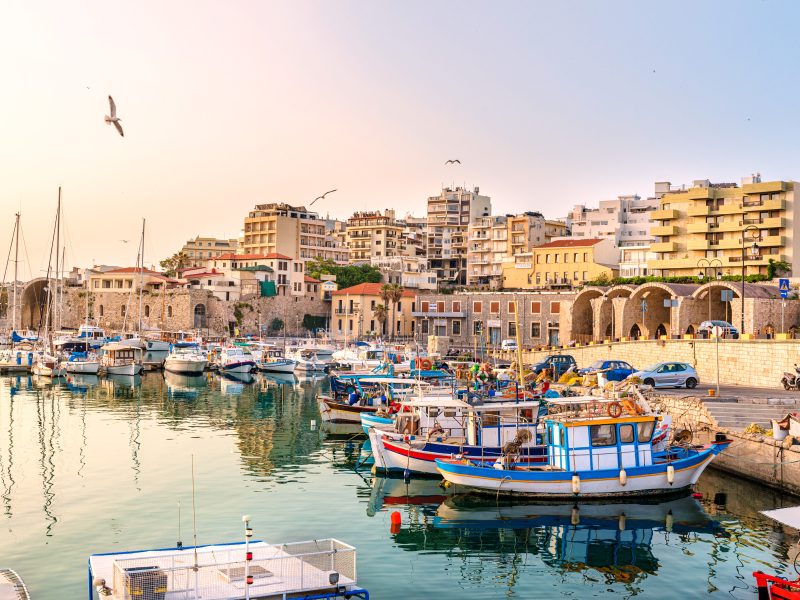 View of Heraklion harbor at sunrise in Crete
