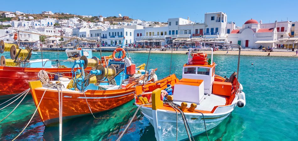 Harbour,With,Wooden,Fishing,Boats,In,Chora,Town,On,Sunny