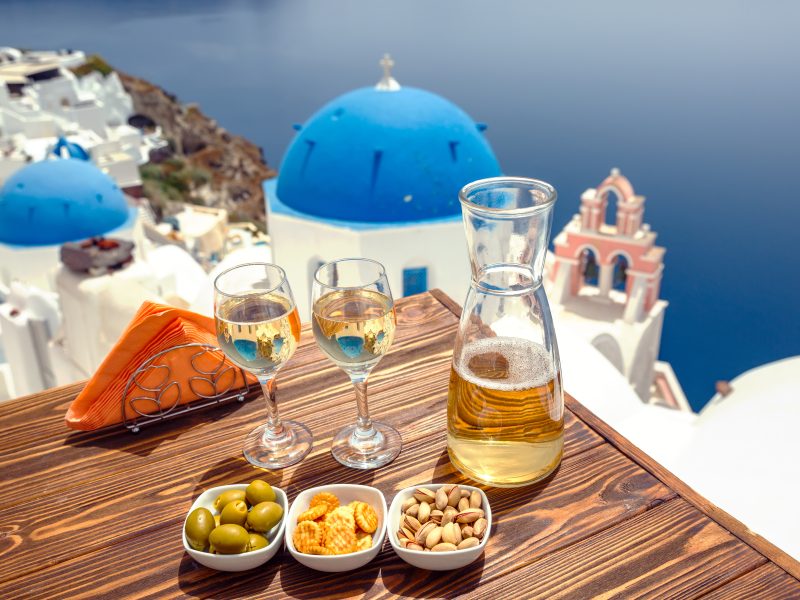 Bottle,Of,Wine,And,Two,Glasses,On,The,Table,,Against