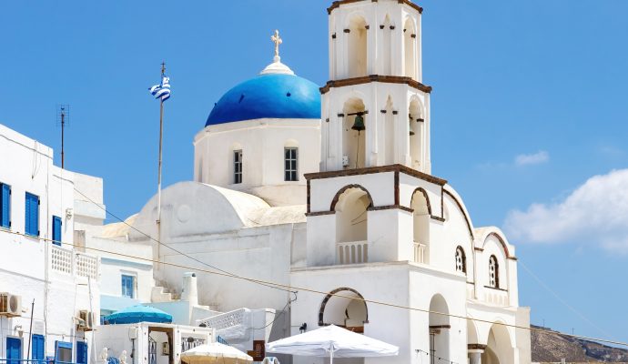Walking Through Santorini Streets. Traditional Greek White Houses Architecture.