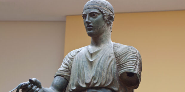 Charioteer statue located at Delphi museum in Greece.